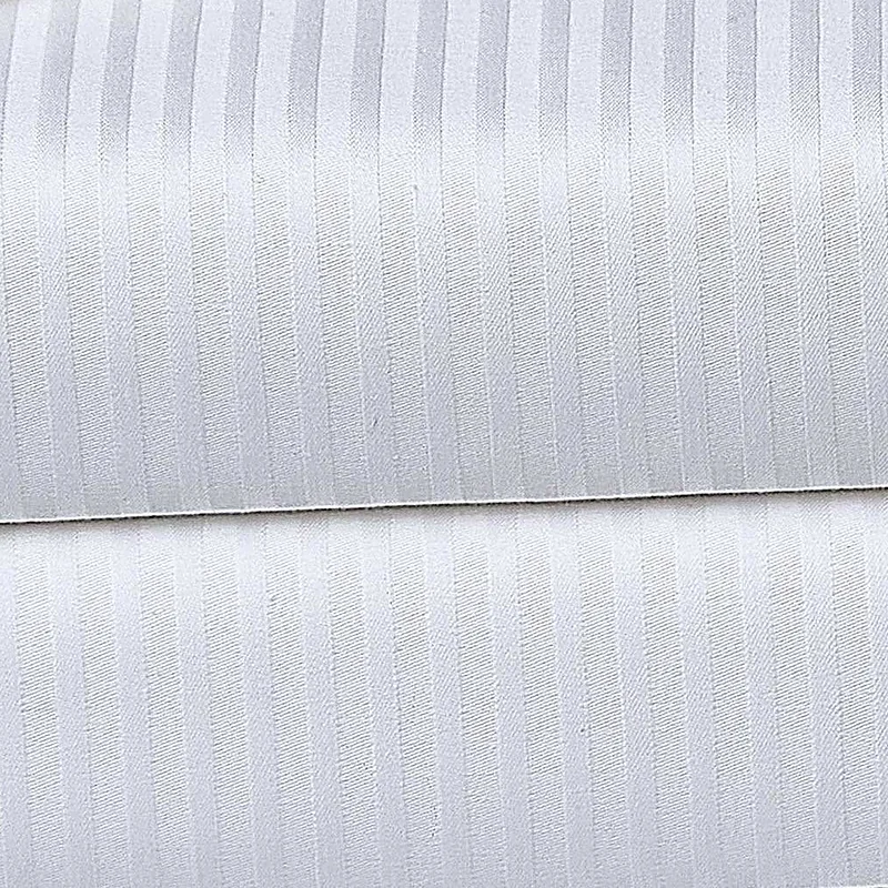 Close-up of white satin fabric with a fine woven stripe